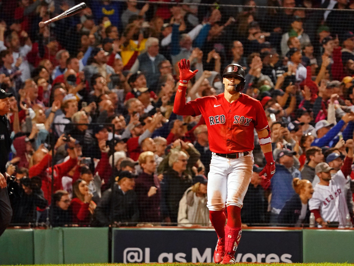 Boston Red Sox center fielder Enrique Hernández (5) flips his bat after hitting a walk-off sacrifice fly against the Tampa Bay Rays to score pinch runner Danny Santana (not pictured) during the ninth inning of Game 4 of the ALDS